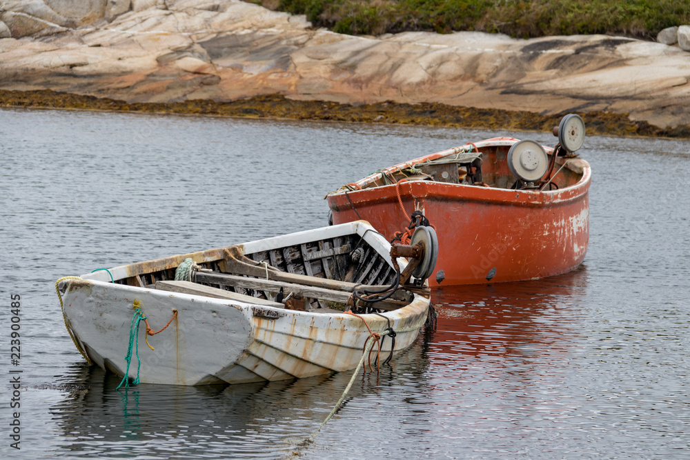 White and red fishing dory in harbour closeup, Peggy's Cove, summer White and red fishing dory in harbour closeup, Peggy's Cove, summer