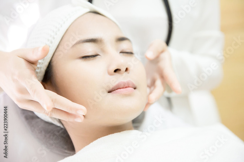 Laser Machine.Young woman receiving laser treatment.Skin Care.Young Woman Receiving Facial Beauty Treatment, Removing Pigmentation At Cosmetic Clinic.IPL. Photo Facial Therapy.Anti-aging Procedures.