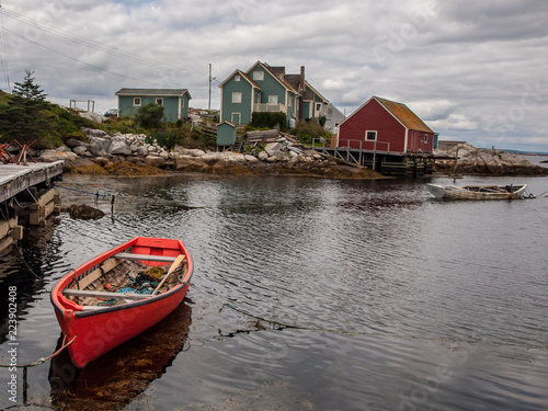 Little red dory on water at Peggy s Cove  Nova Scotia  Canada