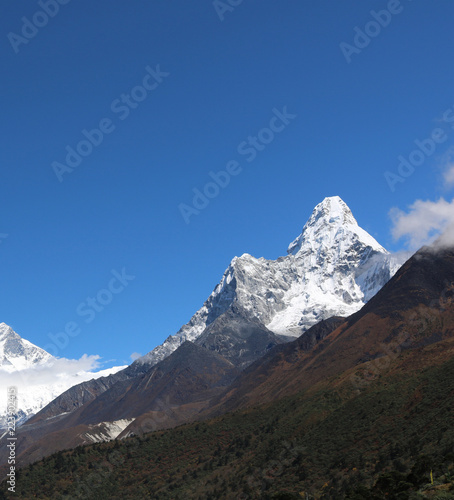 Amazing and Wonderful view of mountain Ama Dablam in the Mount Everest range, iconic peak of Everest trekking route, eastern Nepal