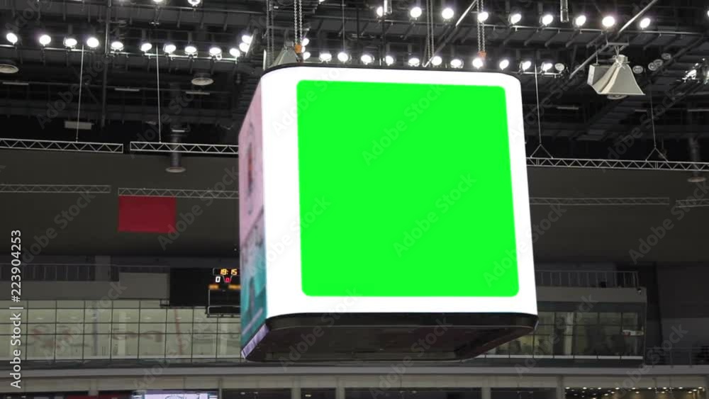 Scoreboard at the stadium with a green screen and banners. Scoreboard at the stadium with a green screen and banners.