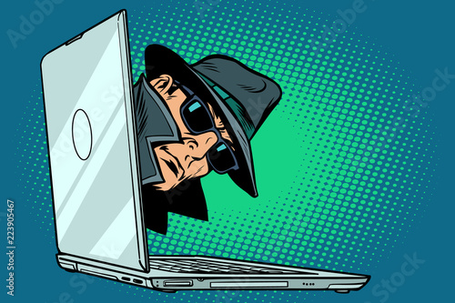 spy. laptop computer. surveillance and hacking