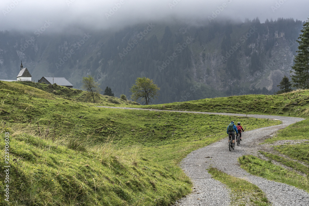 senior couple exploring the Bregenzer Wald in Vorarlberg, Austria, near Mellau and Damuels