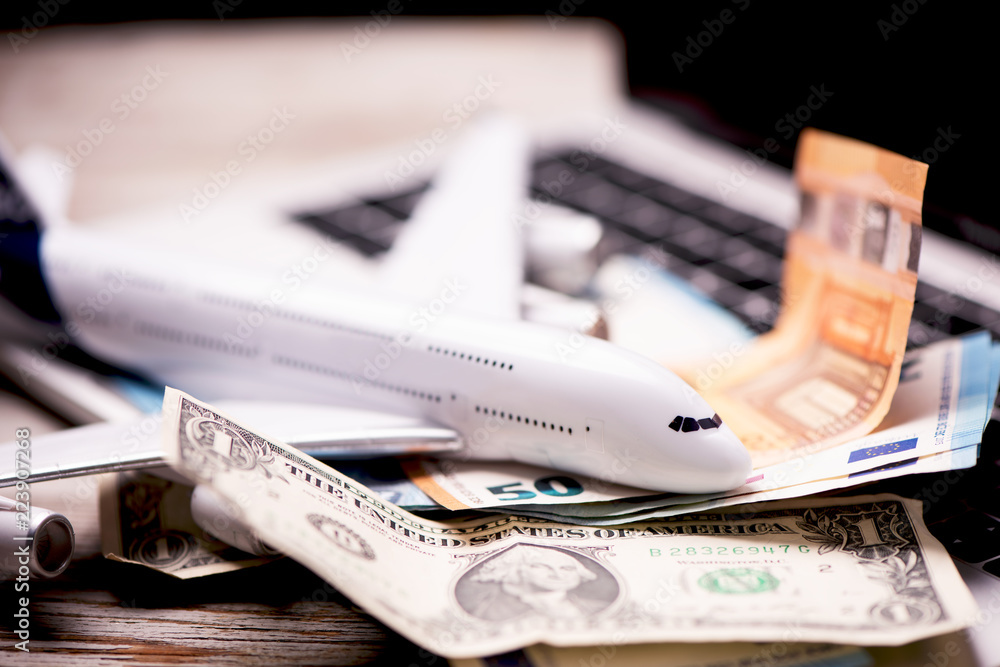 Aircraft banknotes on a notebook Aircraft banknotes on a notebook