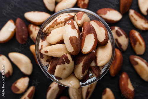 Fotografía brazil nut on a dark stone background