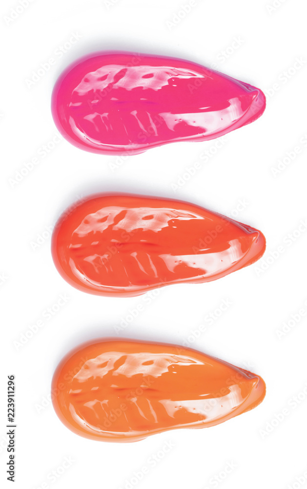 Smudged lipsticks and lipgloss isolated on white background Smudged lipsticks and lipgloss isolated on white background