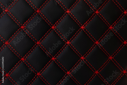 classic black and red leather Mat with straight stitching soft leather machine foot textured pattern collection concept background fabric business