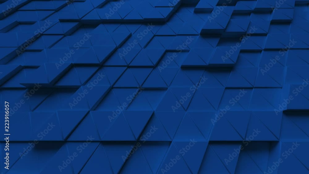 Abstract looping motion background texture of  blue triangles.