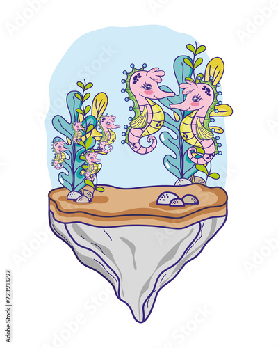 seahorses family animals in the stone with seaweed plants
