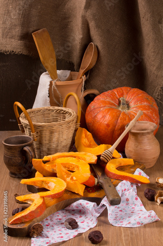 Pumpkin cooking on the kitchen table. Vintage style photo