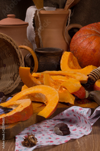 Pumpkin cooking on the kitchen table. Vintage style photo