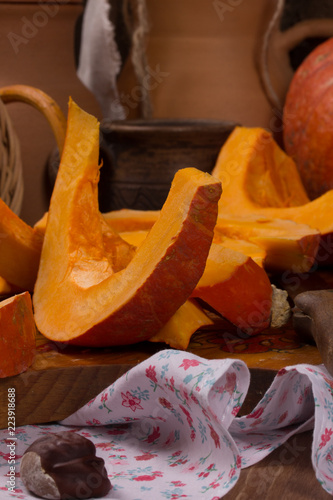 Pumpkin cooking on the kitchen table. Vintage style photo