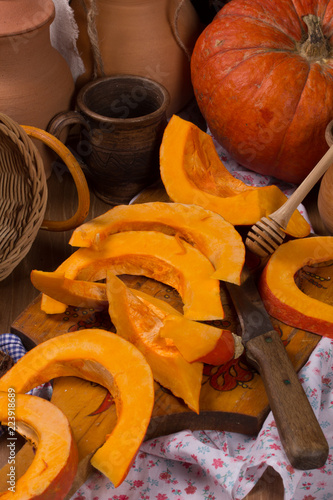 Pumpkin cooking on the kitchen table. Vintage style photo