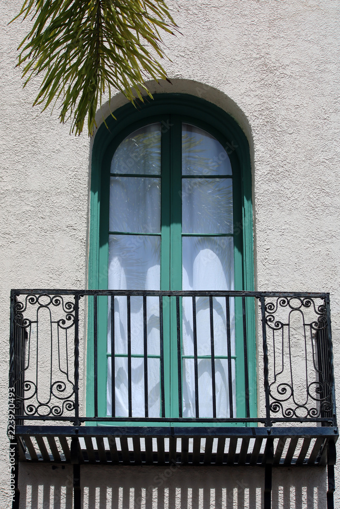 Balcony and Green Arched Window Balcony and Green Arched Window