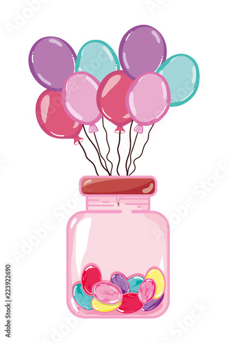 balloons and sweet candies inside glass bottle