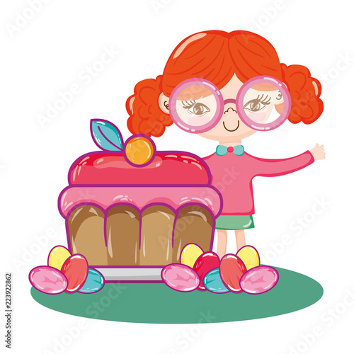 girl with tasty sweet cake and candies