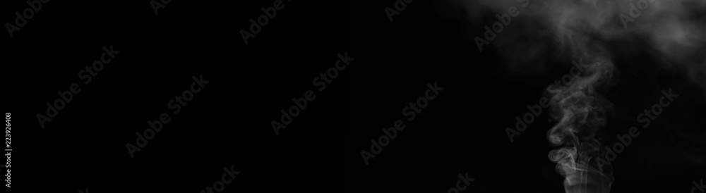 White smoke on a black background. Texture of smoke. Clubs of wh White smoke on a black background. Texture of smoke. Clubs of wh