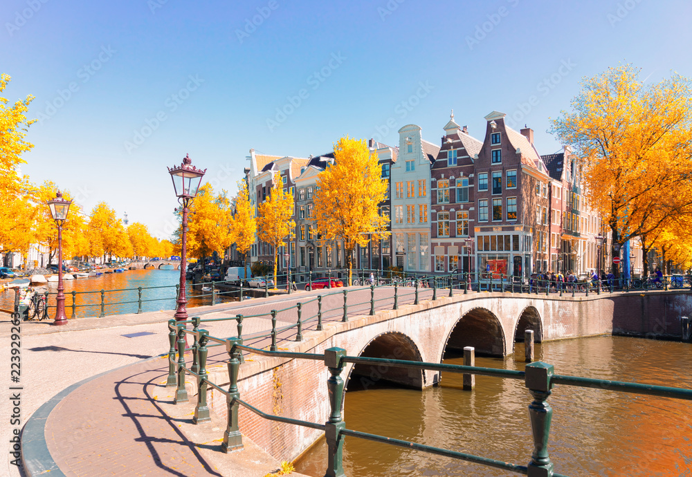 houses of Amsterdam Netherlands over canal ring landmark in old european city, Amsterdam fall scenery