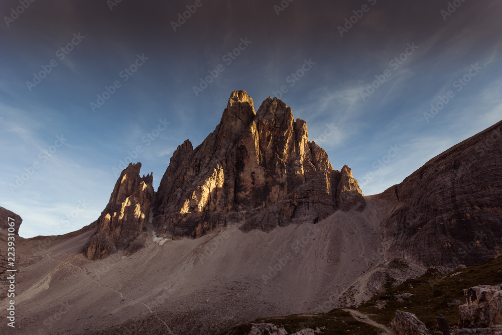 Naklejka premium Last rays of sun that illuminate a beautiful Dolomite peak, South Tyrol, Italy
