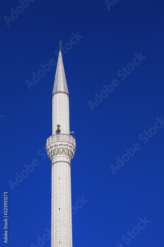 Mosque White Tower against blue sky