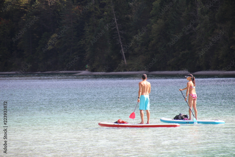 Stand Up Paddling am Plansee StockFoto Adobe Stock