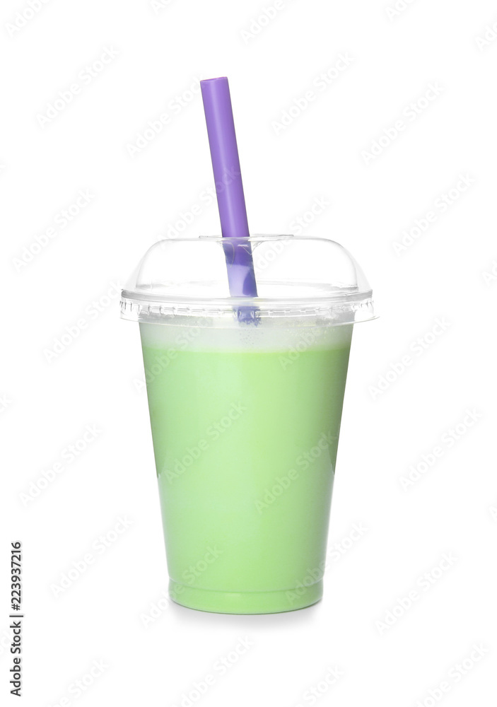 Plastic cup with tasty milk shake on white background Plastic cup with tasty milk shake on white background