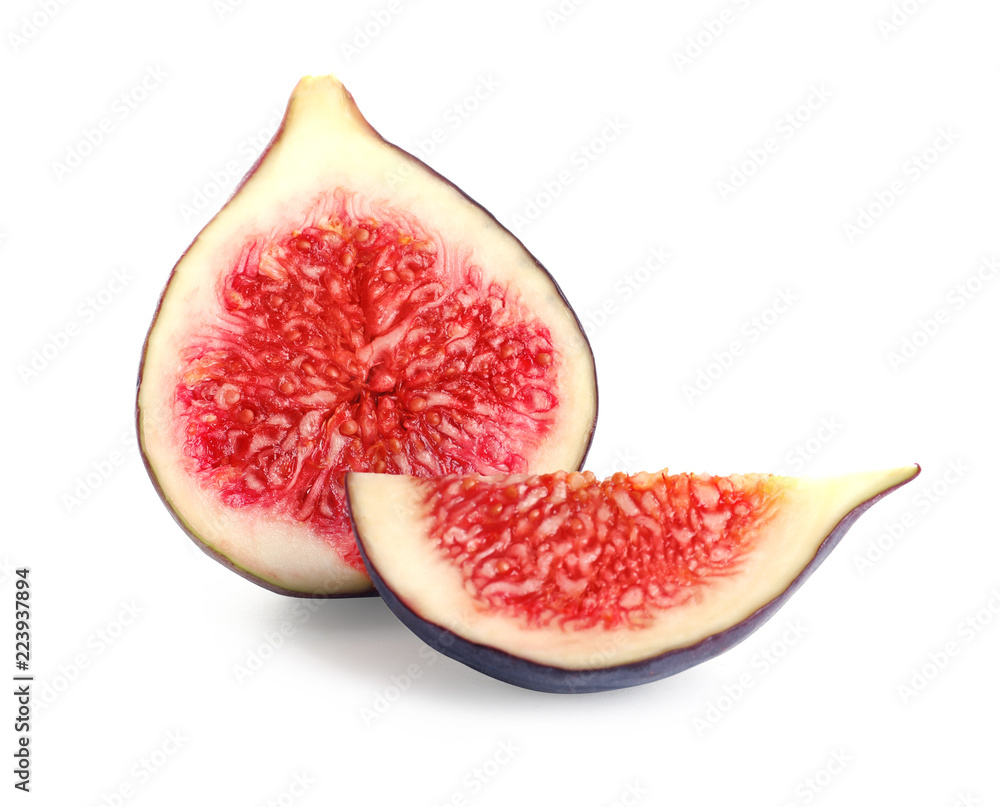 Pieces of ripe purple fig on white background