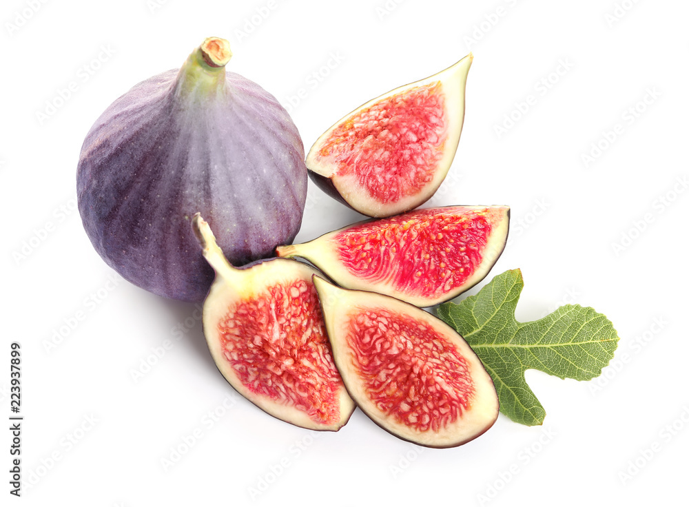 Whole and cut purple figs on white background Whole and cut purple figs on white background