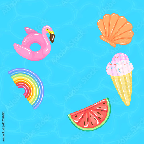 Flamingo, rainbow, watermelon, ice cream cone, seashell pool floats on blue water