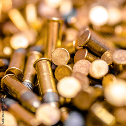 Fotografering Numerous golden bullets heaped together