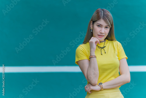Cool Asian hipsters girl wear yellow dress posing for take a photo,lifestyle of modern woman,Thai people in hippie style,Chill day for relax © reewungjunerr