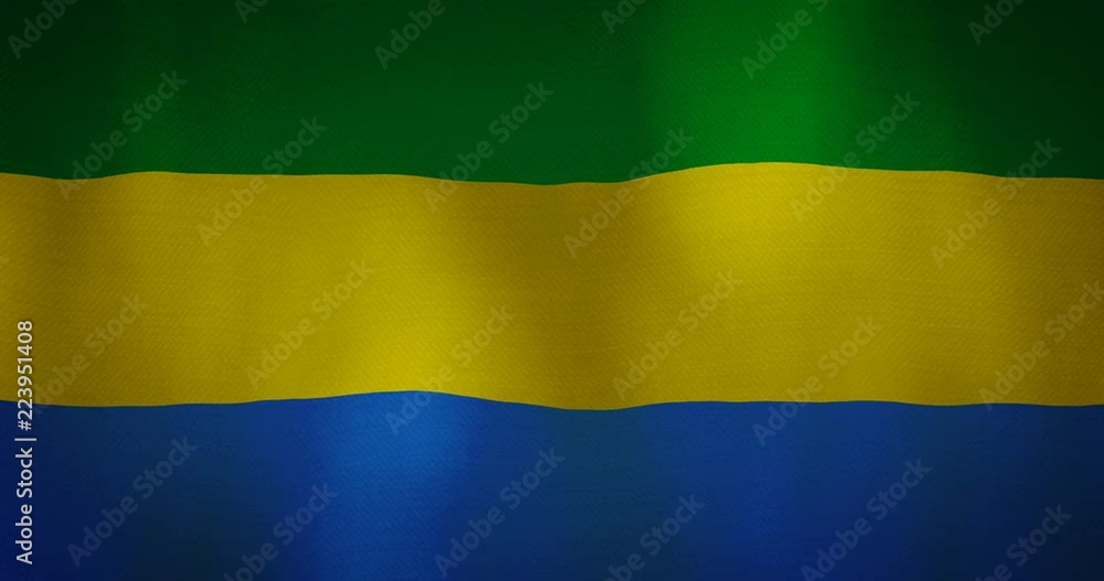 Gabon flag fabric texture waving in the wind. Gabon flag fabric texture waving in the wind.