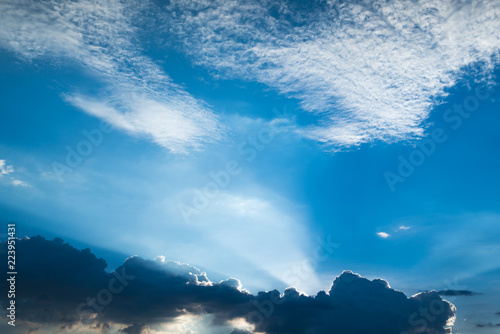 Sun rays through clouds like an dramatic explosion , power nature background.