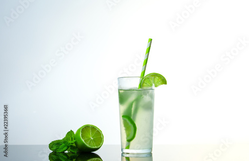 cocktail with ice slices of lime and mint