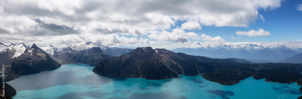 Beautiful panoramic landscape view of Garibaldi Lake vibrant sunny summer day. Taken from top of Panorama Ridge, located near Whister and Squamish, North of Vancouver, BC, Canada.
