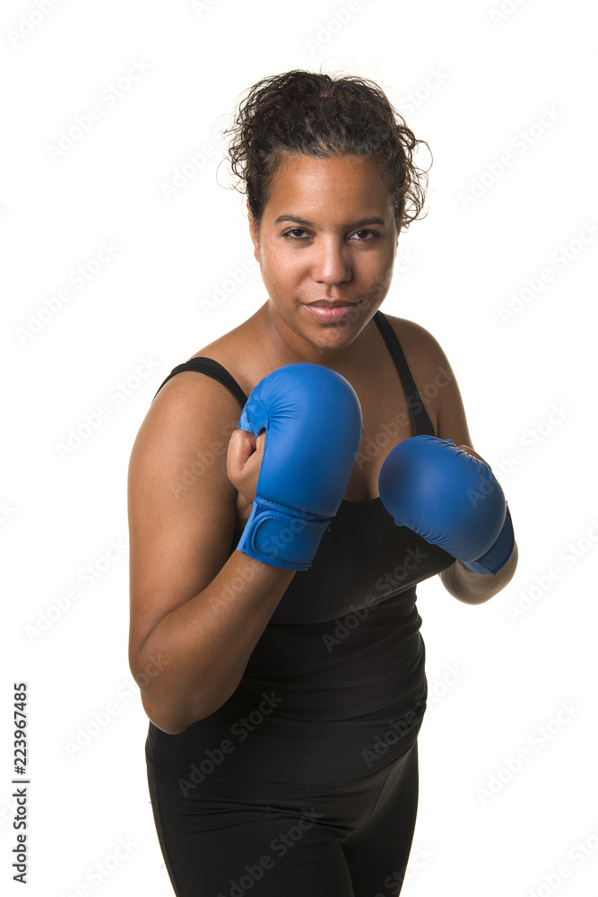 Young pretty black woman with boxing gloves  isolated on a white background in a vertical image