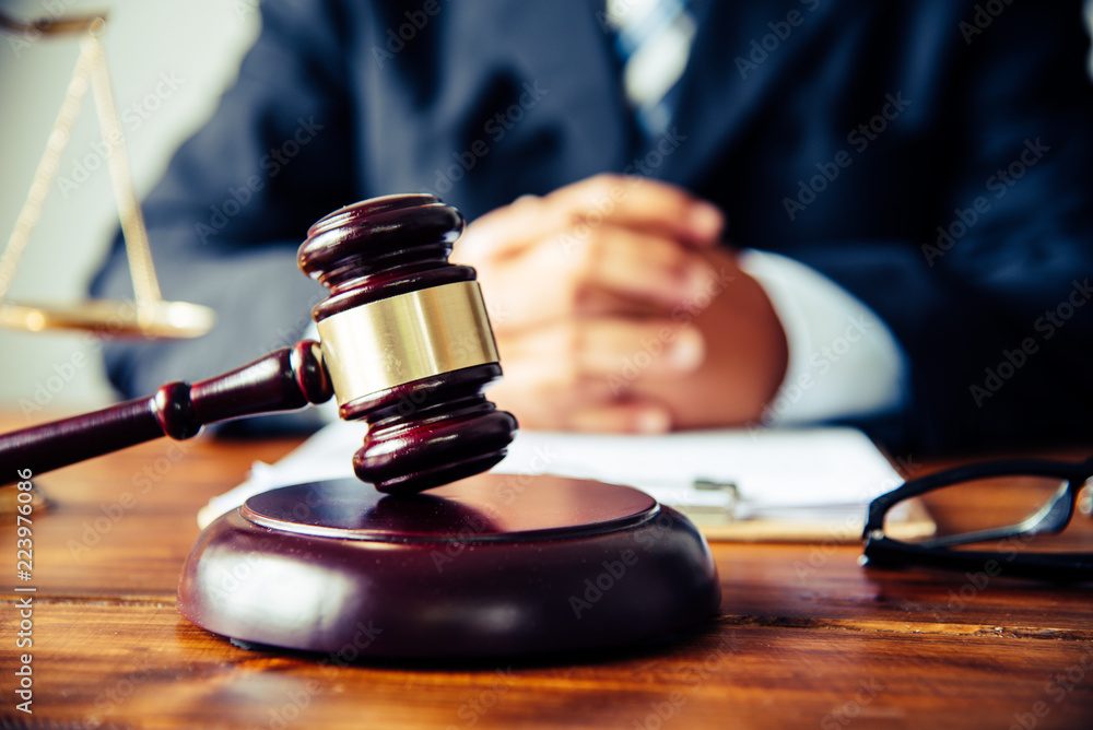 Law theme, mallet of the judge, law enforcement officers, evidence-based cases, and documents taken into account. Law theme, mallet of the judge, law enforcement officers, evidence-based cases, and documents taken into account.