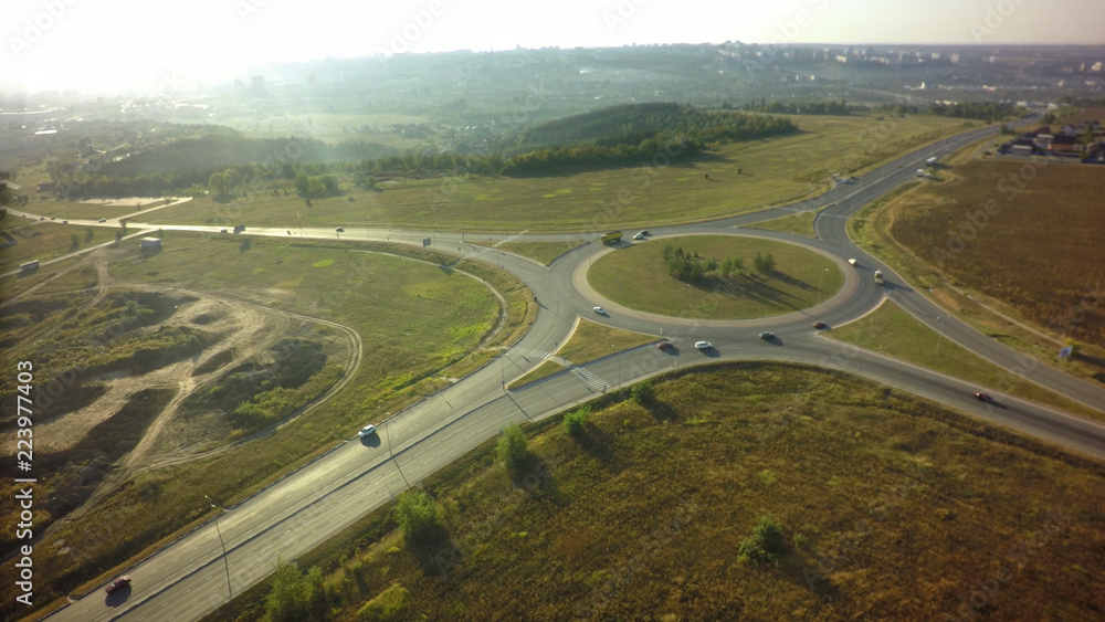 Top view over the highway junction. Aerial Drone Flight View of freeway road