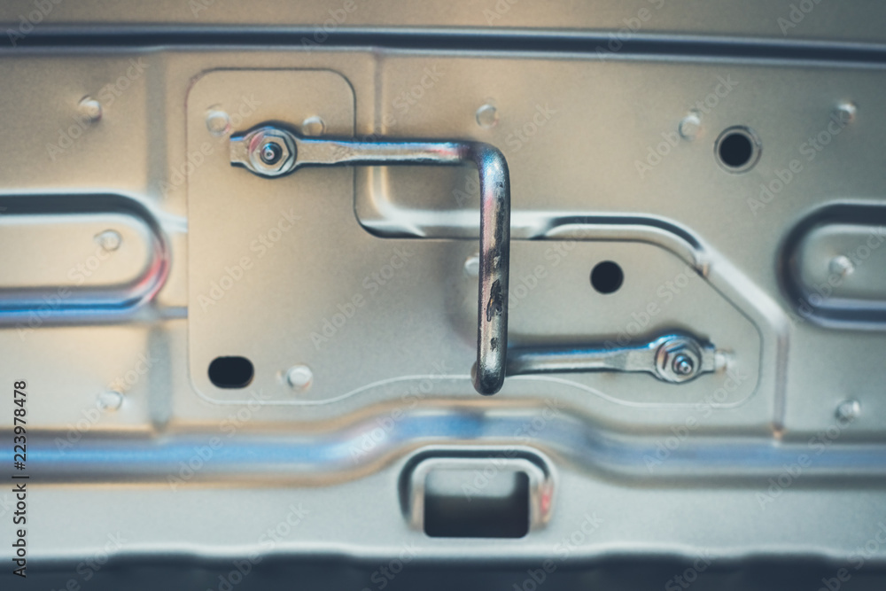The lock loop on the hood of a car The lock loop on the hood of a car