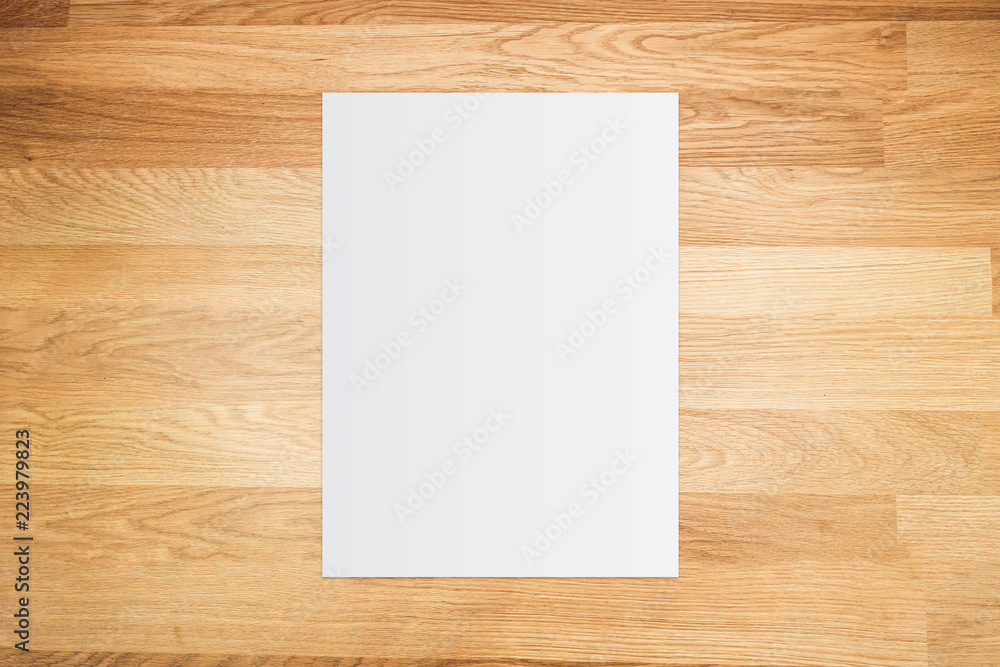 White paper and space for text on old wooden background White paper and space for text on old wooden background