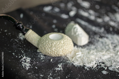 Valokuva meerschaum treated pipe and meerschaum powders