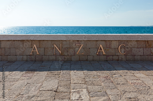 Stone memorial on the beach at Anzac Cove in Gallipoli where allied troops fought in World War 1 in Canakkale Turkey photo