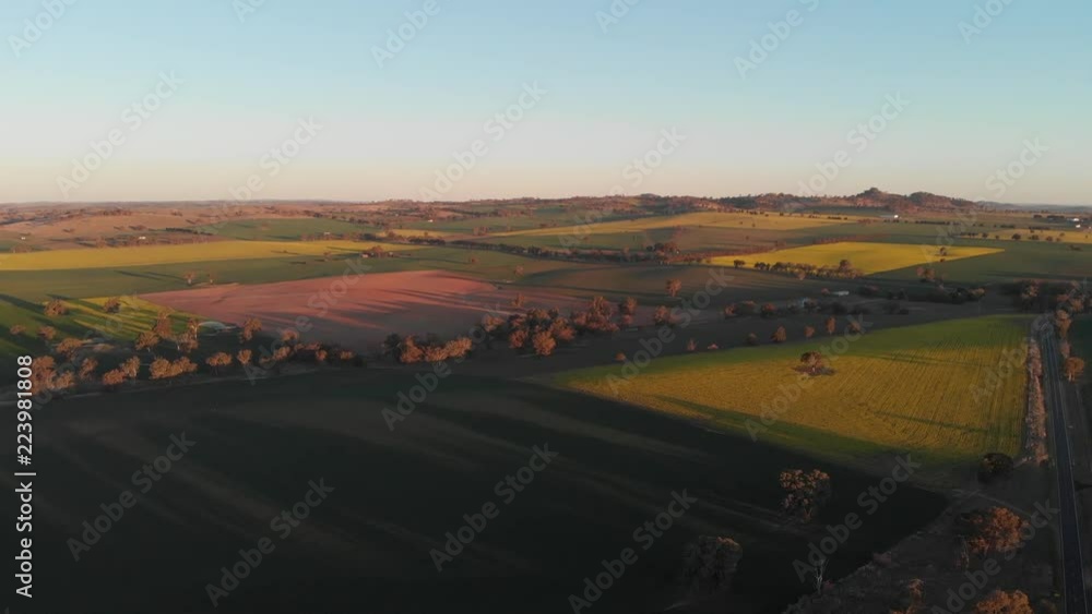 Sunset rural agriculture crop farming aerial flyover view Australia landscape Sunset rural agriculture crop farming aerial flyover view Australia landscape
