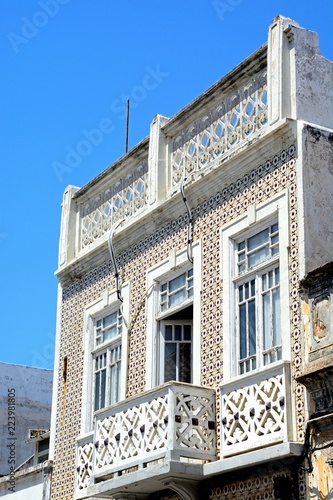 Traditional Portuguese building in the old town with tiled walls, Olhau, Portugal. photo