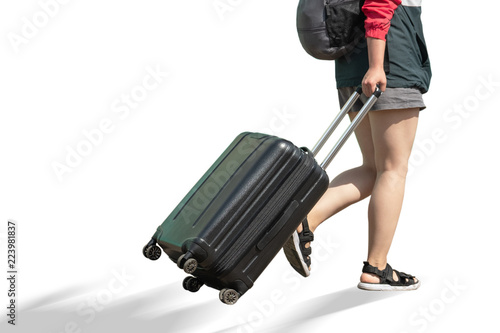 Vászonkép The girl is coming with a suitcase.