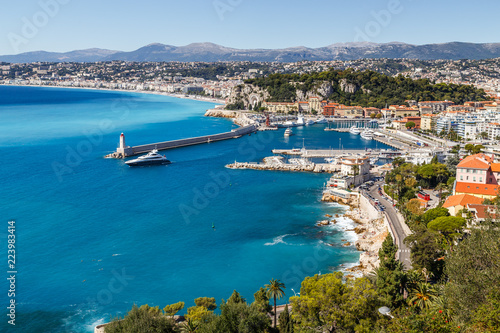 Aerial view of the old harbor, lighthouse and the city architecture. Nice, Cote d'Azur, France.
