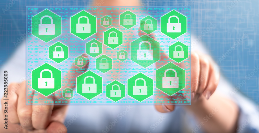 Woman touching a data security concept Woman touching a data security concept