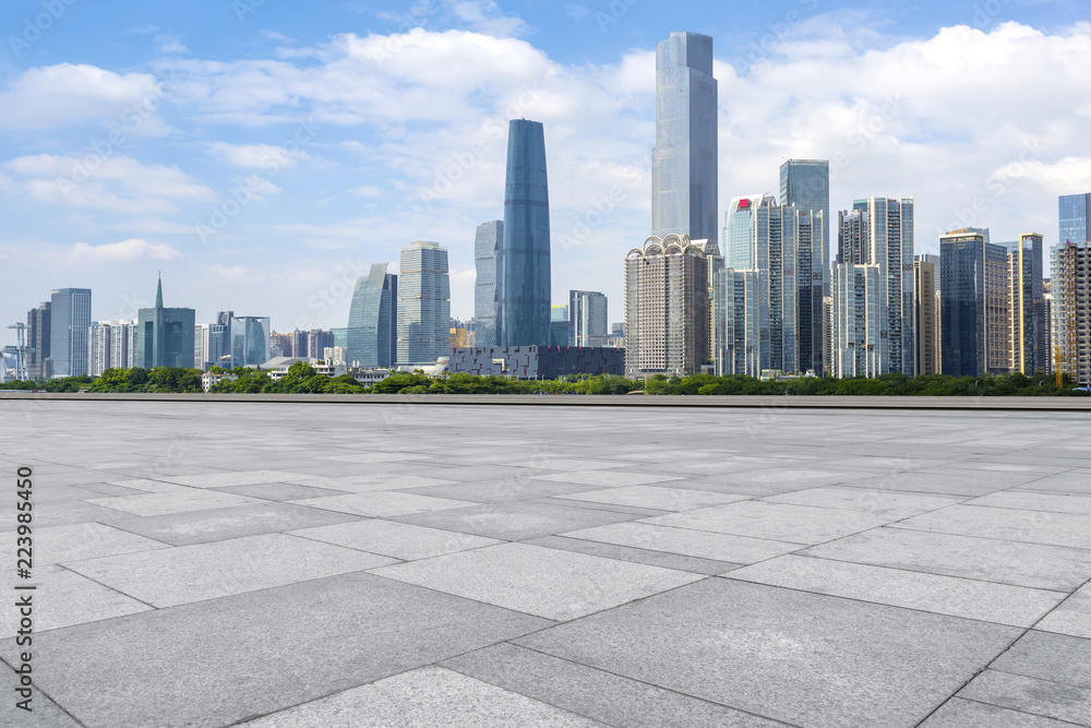 Urban skyscrapers with empty square floor tiles