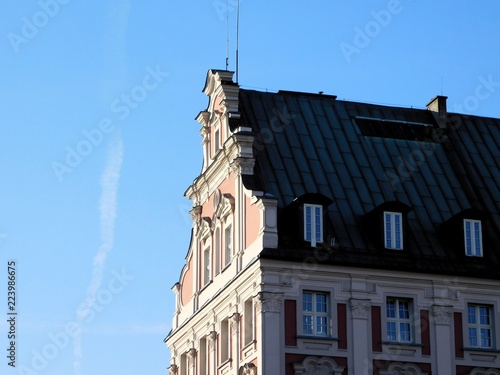 photo of city hall office building in Poznan, former Jesuit College, on a beautiful sunny Saturday morning