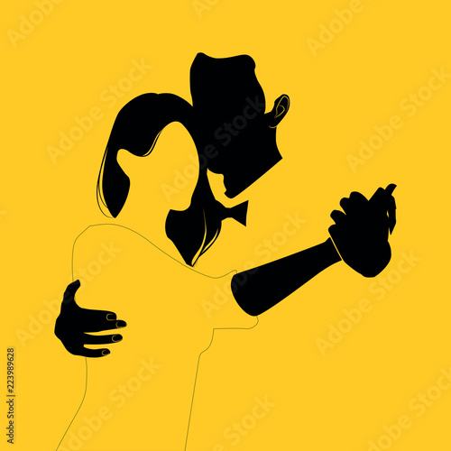 Silhouette of couple dancing on yellow background